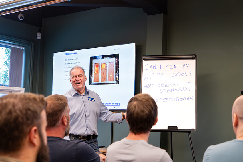 What makes a fire door compliant under UK law?